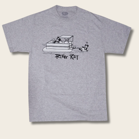 A heather gray short-sleeve t-shirt featuring a black line art graphic of a cartoon mouse in a pontoon boat with the text 'River Rat' underneath, displayed against a light beige background.