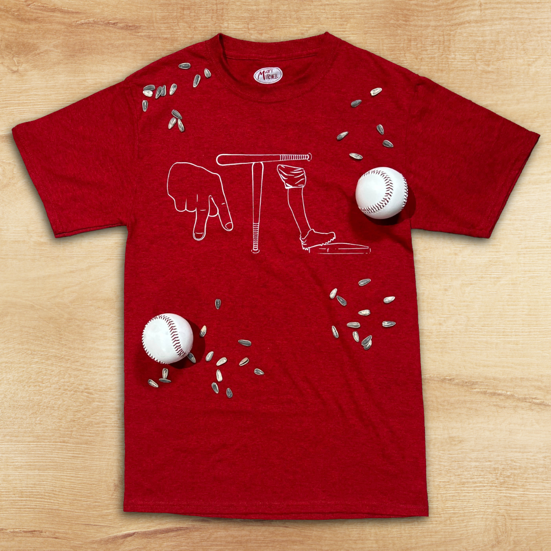 Atlanta baseball inspired southern humor shirt laid flat on wood background with baseball and sunflower seed props