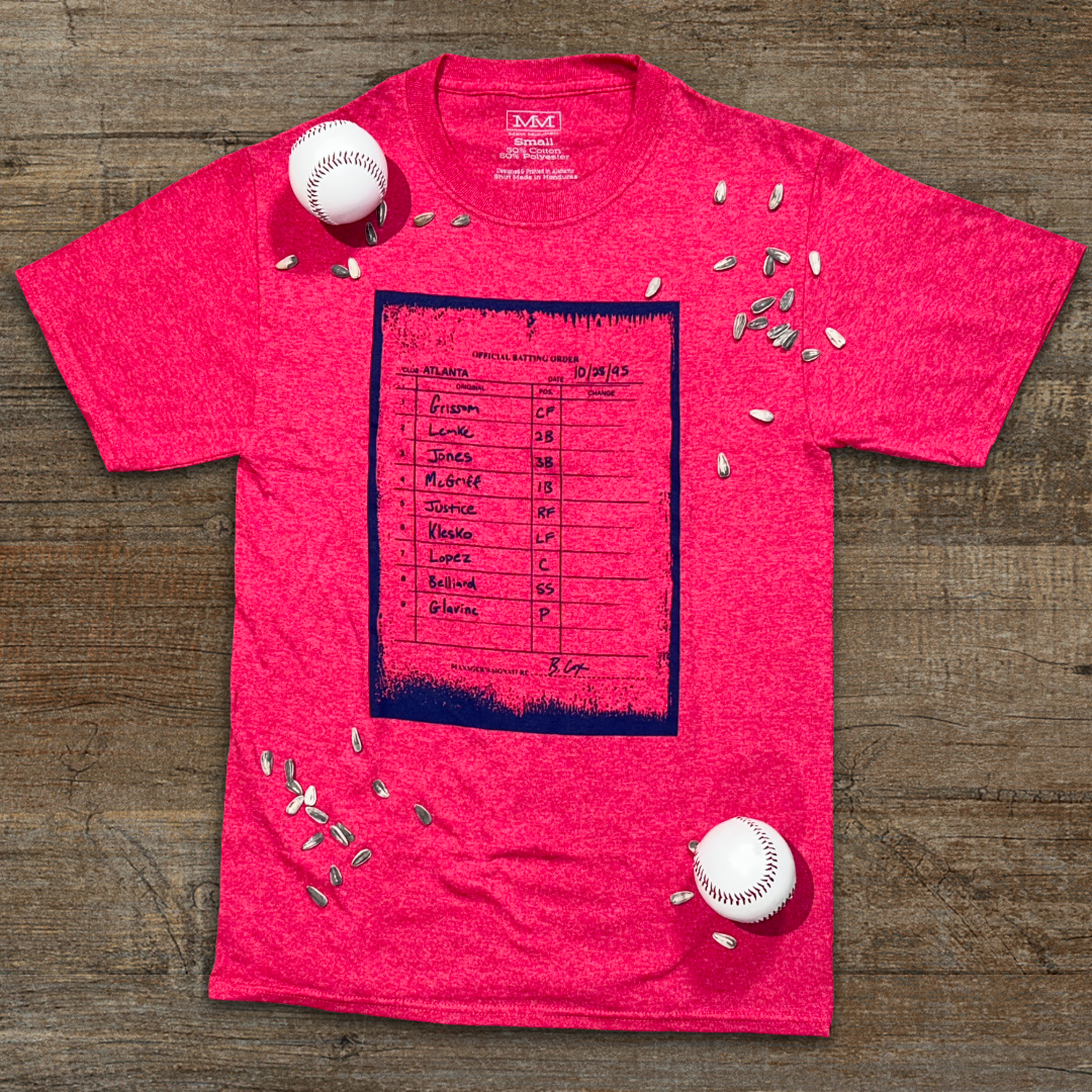 Vintage Atlanta baseball shirt with 1995 lineup card design known as '95 Clinch Card on red tshirt with wood background