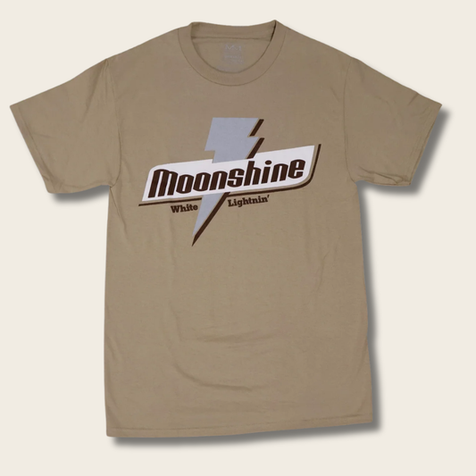 A tan crewneck t-shirt featuring a 'Moonshine White Lightning' graphic on the chest, displayed against a light beige background.